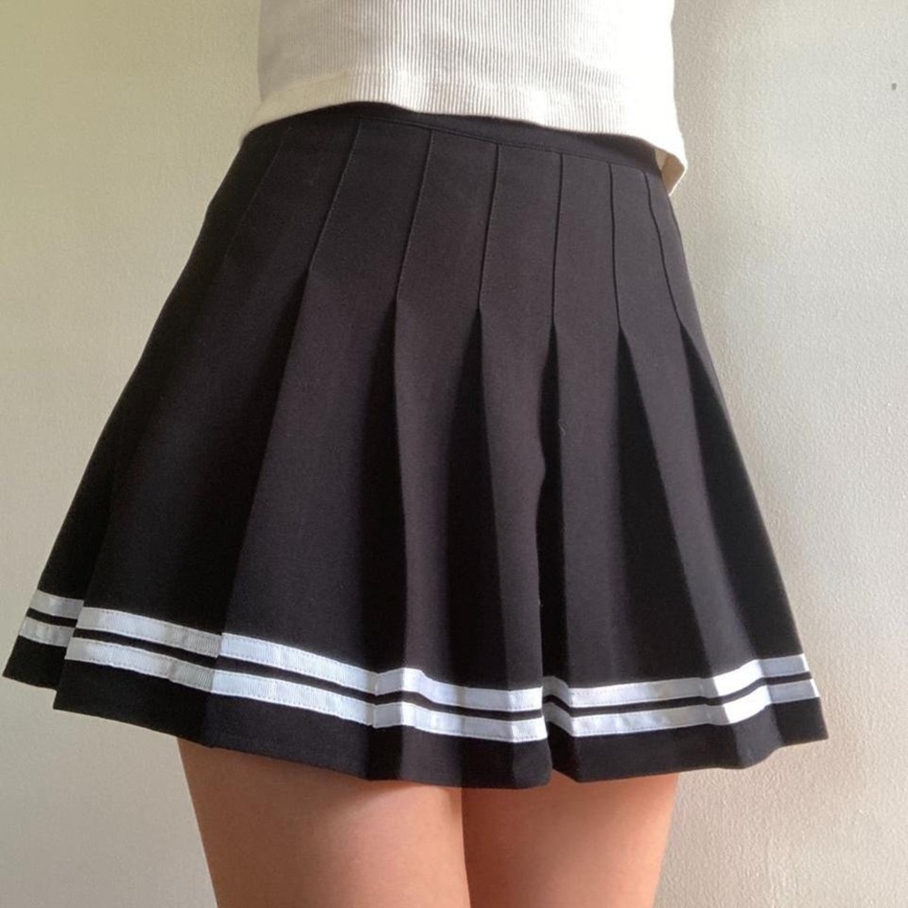 black pleated tennis skirt with white stripes